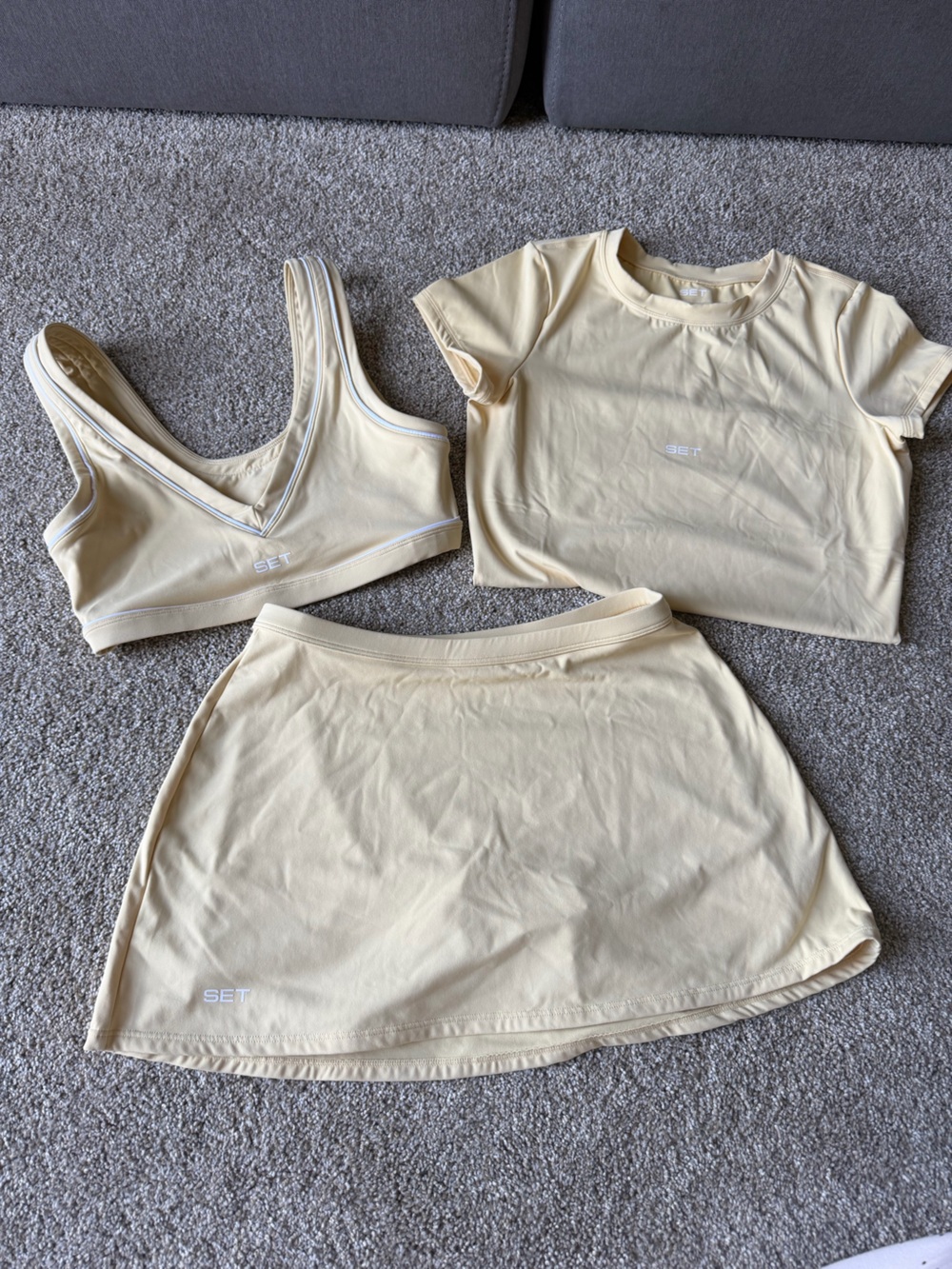 Set Active Butter Yellow skort + bra + top set